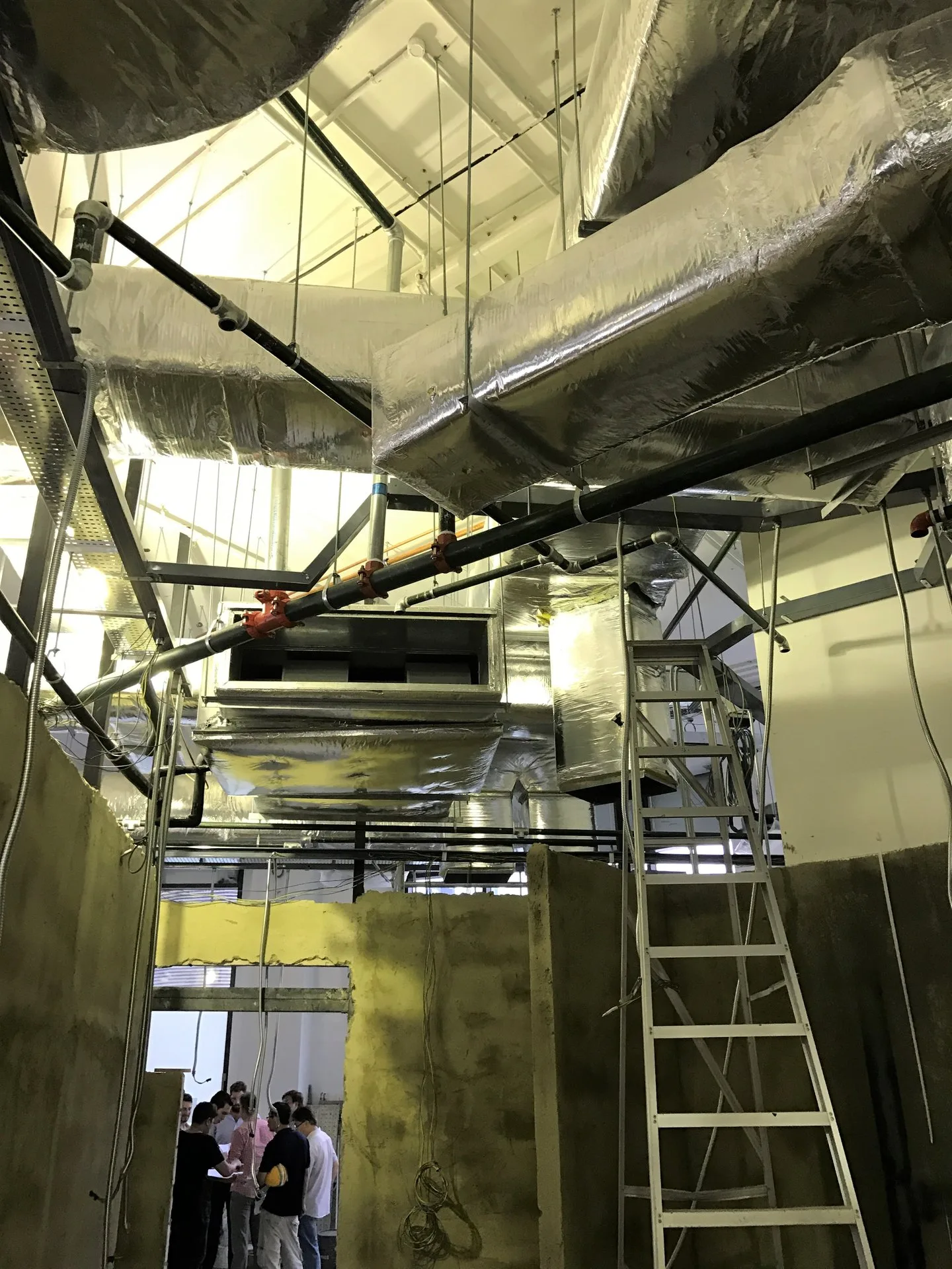 AHU and insulated ducting installation in progress on a commercial fit-out